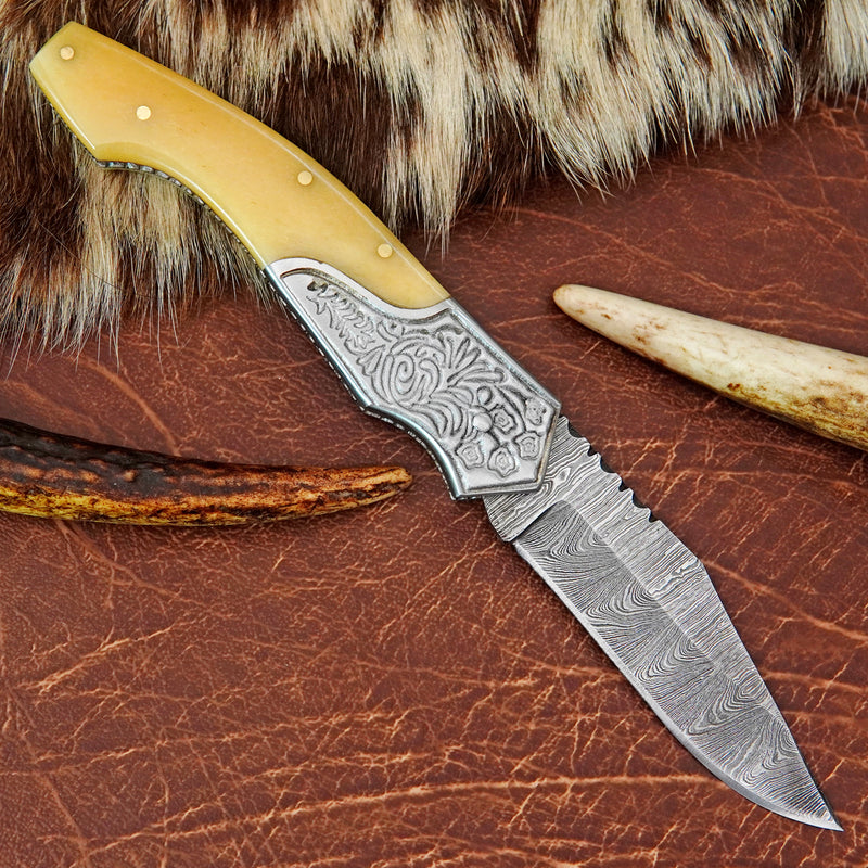 Pocket Folding Knife EDC Hand Forged in Damascus Steel Engraved Bolster and Camel Bone Handle with Leather Sheath SQFOL01